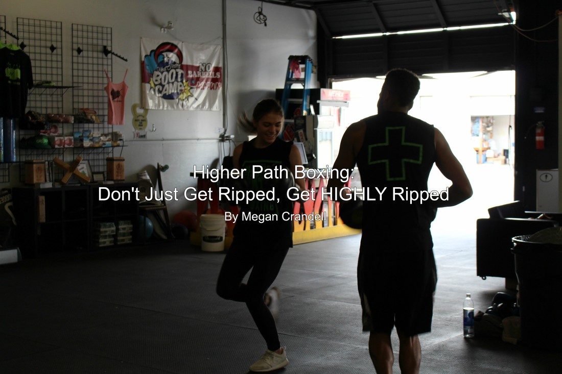 Two people training in a boxing gym, with overlaid text reading Higher Path Boxing: Don’t Just Get Ripped, Get HIGHLY Ripped by Megan Crandell.
