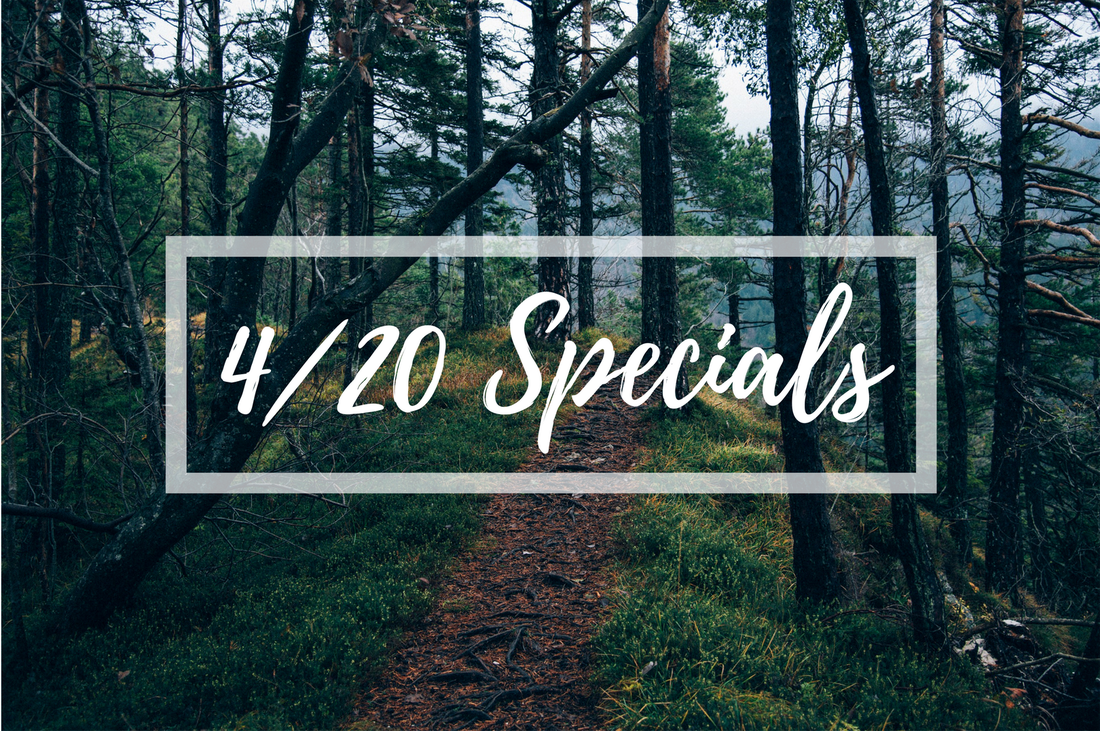 Forest trail with trees and greenery, overlaid text reading ‘4/20 Specials.’